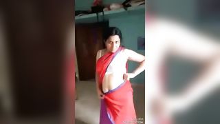 Indian Porn MMS Showing Sexy Aunty Stripping Red Saree