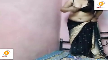 Plump aunty shaking her fleshy tummy