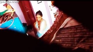 Desi maid changing dress captured using hidden livecam placed in room