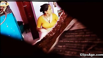Desi maid changing dress captured using hidden livecam placed in room