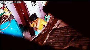 Desi maid changing dress captured using hidden livecam placed in room