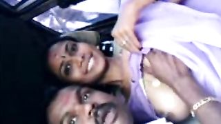 Tamil aunty outdoor boobs show in car  Paramour sucks hard nipples
