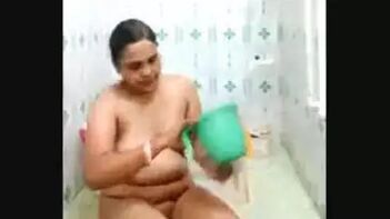 Desi Hot Bhabhi Getting Naughty in Bathroom - Watch 2 Sexy s Now!