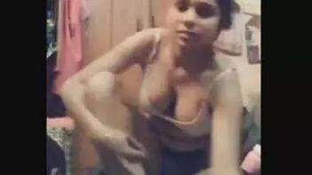 Sizzling Desi Babe Stripping to Bra and Panty On Camera - A Must-See!
