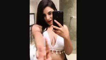 Desi Sex Goddess Flaunts Her Curves In White Bikini and Deep Navel
