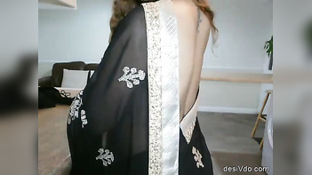 Sizzling Hot Desi Bhabhi Flaunts Boobs in See-Through Black Saree!