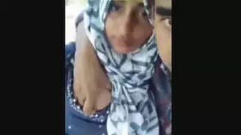 Sizzling Desi Hijab Girl: Watch Her Smooch and Boob Press Passionately!