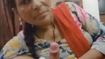 Experience the Thrill of Desi Mature Bhabhi Blowjob and Fucking!