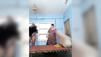 Mature Bhabhi Caught in XXX Affair with Fat Desi Neighbor - Watch the Shocking MMS Video!