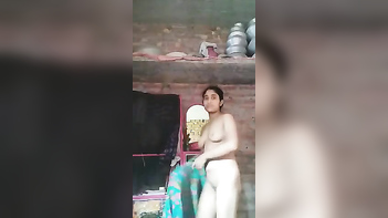 Sensuous Desi Woman Strips Down Piece by Piece for Intimate Nude Posing