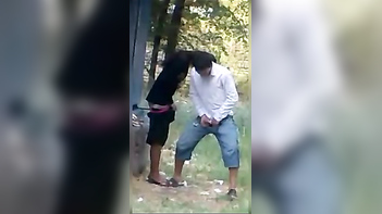 Leaked Desi MMS Sex Video: Wife Cheats on Sleeping Husband Outdoors
