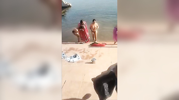 Lusty Bhabhi bathing toipless in pond, Desi leaked porn videos