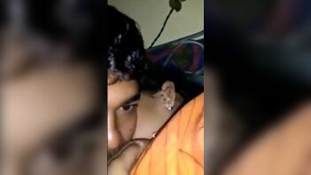 Desi Aunty Caught Feeding Titties to Neighbor Guy: Shocking Video Goes Viral!