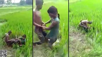 Indian Man Attempts to Force His Wife Outdoors in Rice Field