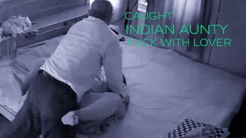Hidden Cam Catches Desi Aunty Having Steamy Sex With Lover in Hotel Room