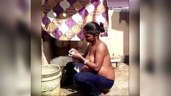Shocking Video: Pregnant Village Aunty Caught Bathing Outdoors on Hidden Camera