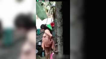 Indian Woman's Bodacious Bathtime Captured on Amateur Video!