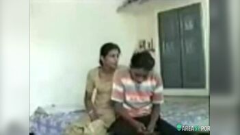 Desi Aunty Seduces Girlfriend's Son in His Bedroom - An Unforgettable XXX Experience
