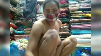 Watch Desi Saleswoman's Nude Show in Clothes Shop: Indian Porn XXX Big Boobies