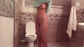 Indian Aunty's Shocking Selfie: Filming Naked While Taking a Shower In Hotel Bathroom