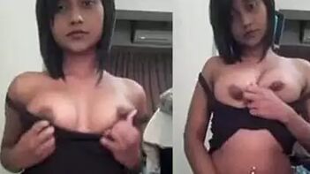 Indian Adult Webcam Model Flashes Her Breasts and Gives Them a Squeeze