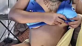 Indian Woman in Yellow Sari Caught on Camera Hiding Nipples in Porn Video