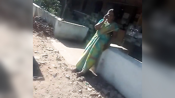 Indian Aunty Rocks the Look with a Satin Silk Saree and Fingering Technique