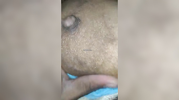 Close Up View of Indian Man Pleasuring His Wife With Nipple Play