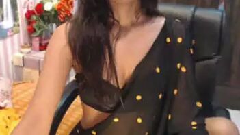 Sensational Desi Girl Mahi Wows Crowd in Black Saree Erotic Performance