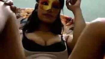 Masked Indian Woman Dons Green Panties for Webcam Performance, Not Porn