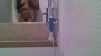 Unsuspecting Indian Girl Unaware of Hidden Camera While Taking Shower