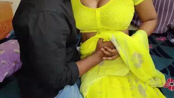 Watch Desi Indian Beauty in a Hot Yellow Saree - Part 1