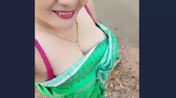 Desi Aunty Flaunts Her Hot Curves with Boobs Selfie on Cam