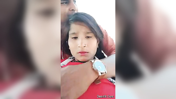 Handsome Young Man Gently Grazes Indian Woman's Perfect Breasts Through Red Dress