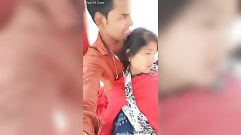 Handsome Young Man Gently Grazes Indian Woman's Perfect Breasts Through Red Dress