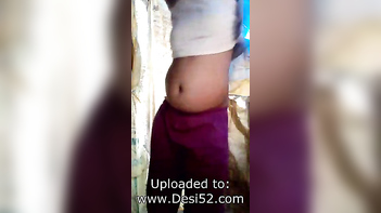 Horny Village Bhabhi's Bathing and Fingering Session Captured on Camera