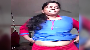 XXX Striptease: Indian Woman Creates Sensual Experience For Sex Fans From Behind Closed Doors