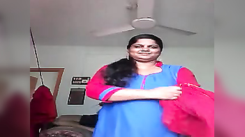 XXX Striptease: Indian Woman Creates Sensual Experience For Sex Fans From Behind Closed Doors