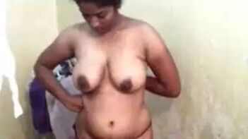 Desi Teen Can't Help But Touch Her Own Sweet Tits While Showering