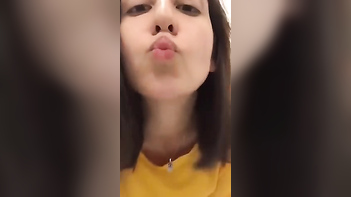 Sultry Siren Flaunts Her Busty Assets