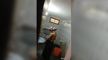Desi Skinny Unaware of Camera Spying While Wearing Clothes