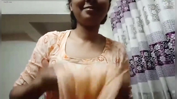 Watch Now: Hot Indian Wife Flaunting Her Sexy Boobs in Tube Video