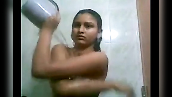 Watch Desi Big Boobs Sister Bathing and Dressing Up in this Indian Porn Tube Video
