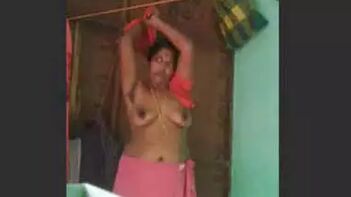 Watch Mallu Aunty's Record-Breaking Change of Clothes Caught on Hidden Cam