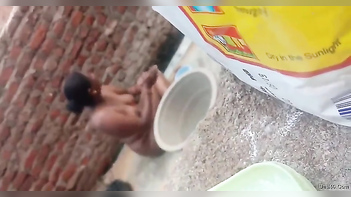 How an Indian Neighbor Secretly Washes Xxx Assets Outdoors - Captured on Camera by a Boy