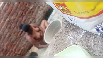 How an Indian Neighbor Secretly Washes Xxx Assets Outdoors - Captured on Camera by a Boy