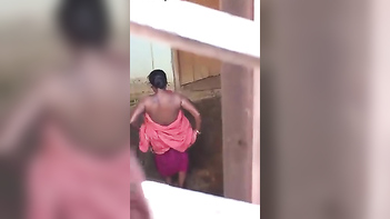 Boy Spies On Desi Woman Taking A Shower and Revealing Her Sensual Curves
