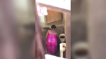 Boy Spies On Desi Woman Taking A Shower and Revealing Her Sensual Curves