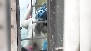Desi Babe Gets Secretly Filmed In The Bathroom, Showing Off Her Tight Pussy