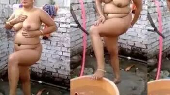 Desi Wife Shows Off Her Juicy Boobs and Tight Booty in the Bathroom